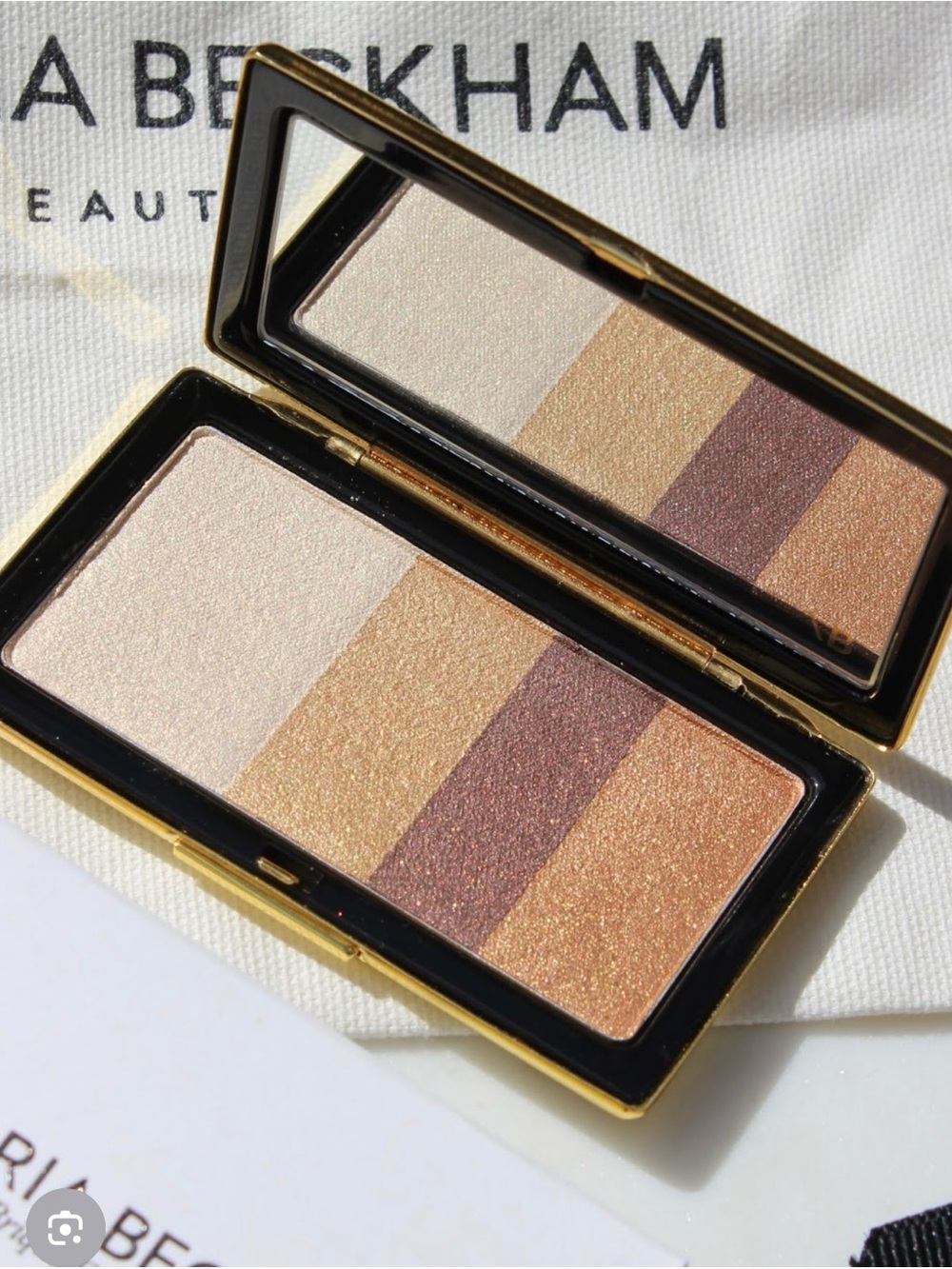 NEW NWT VICTORIA BECKHAM
Smokey Eye Brick In Silk